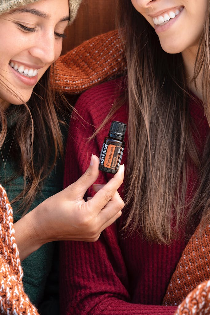 A Woman holding Essential Oils
